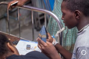 Teenage patient working on 3Dpuzzle - lluvia health